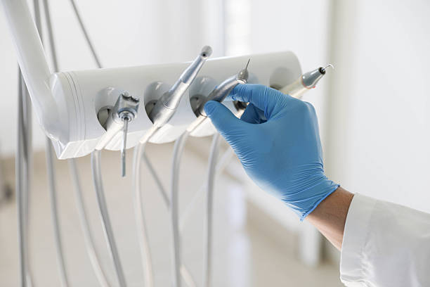 Professional Tooth Extraction technician working in Cypress, CA
